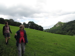 SX16170 Jenni and Margaret setting off again with Carreg Cennen Castle on top of distant cliffs.jpg